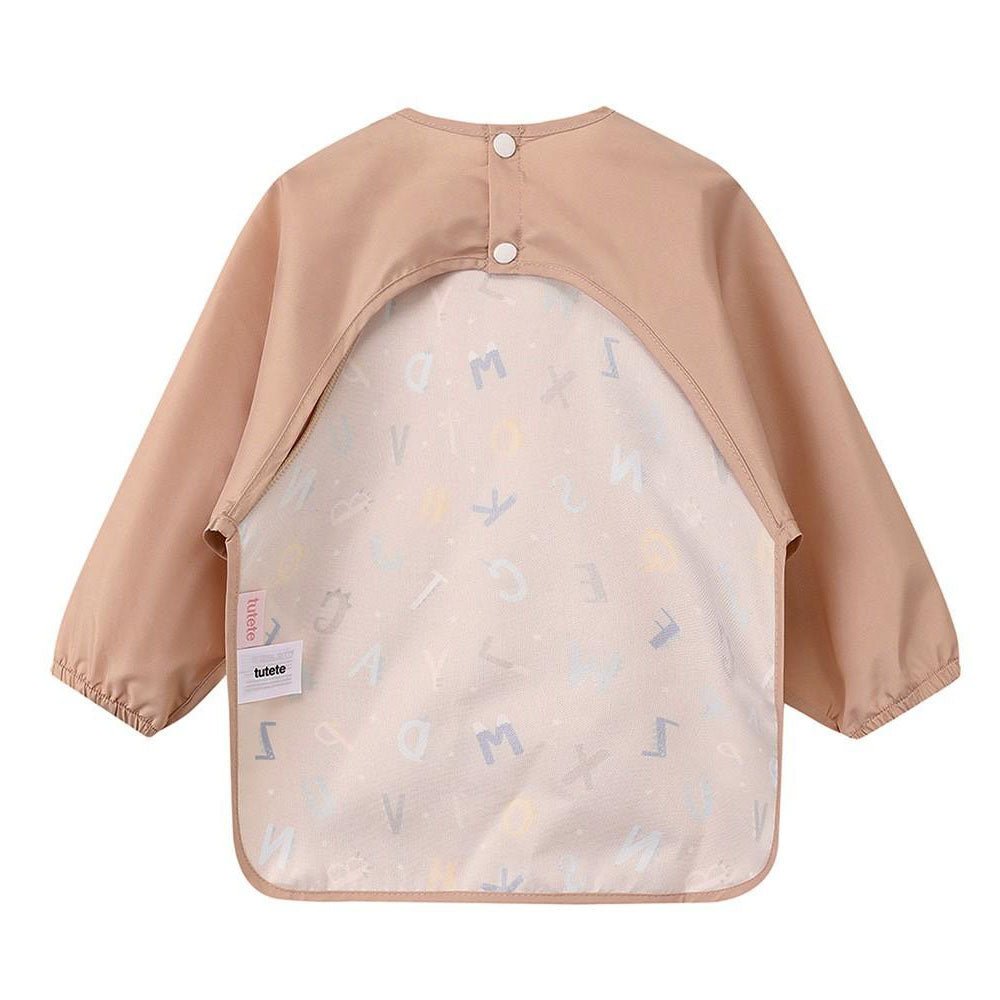 BABERO CON MANGAS TUTETE ·FUNNY LETTERS· - Happy Moments Baby