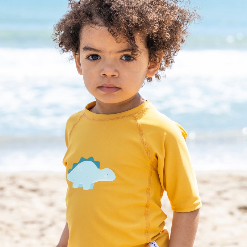 CAMISETA INFANTIL DE PROTECCIÓN SOLAR SARO ·DINOS· - Happy Moments Baby