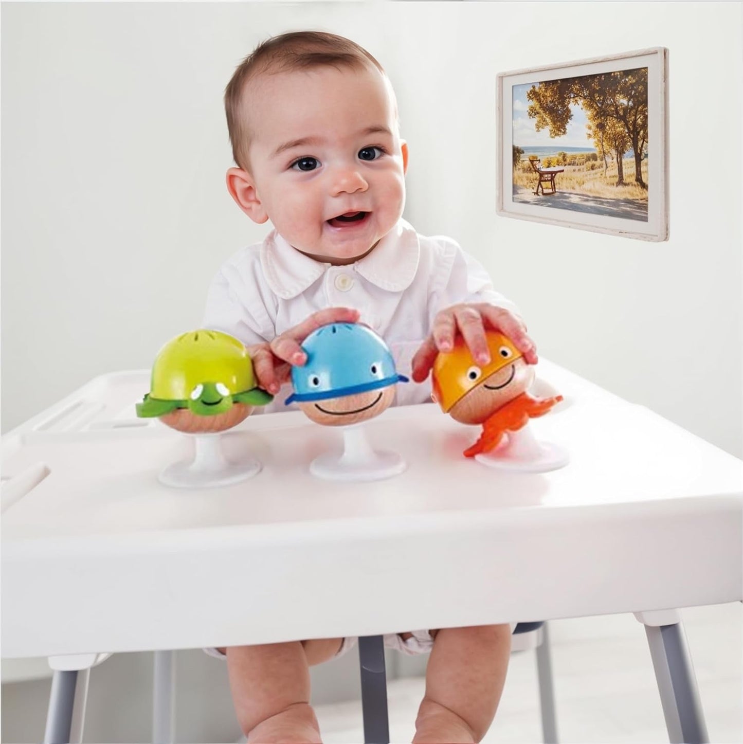 JUGUETE SENSORIAL HAPE ·JUEGO DE 3 SONAJEROS ADHESIVOS· - Happy Moments Baby