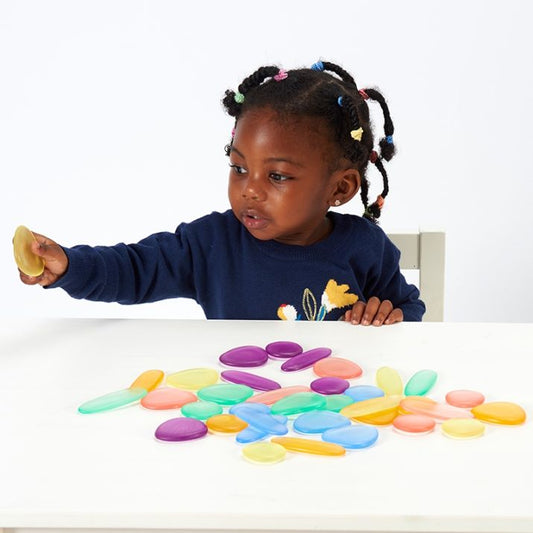 SET DE 36 UNIDADES DE PIEDRAS DE RÍO DE COLORES TRANSLÚCIDAS TOPILUDO - Happy Moments Baby