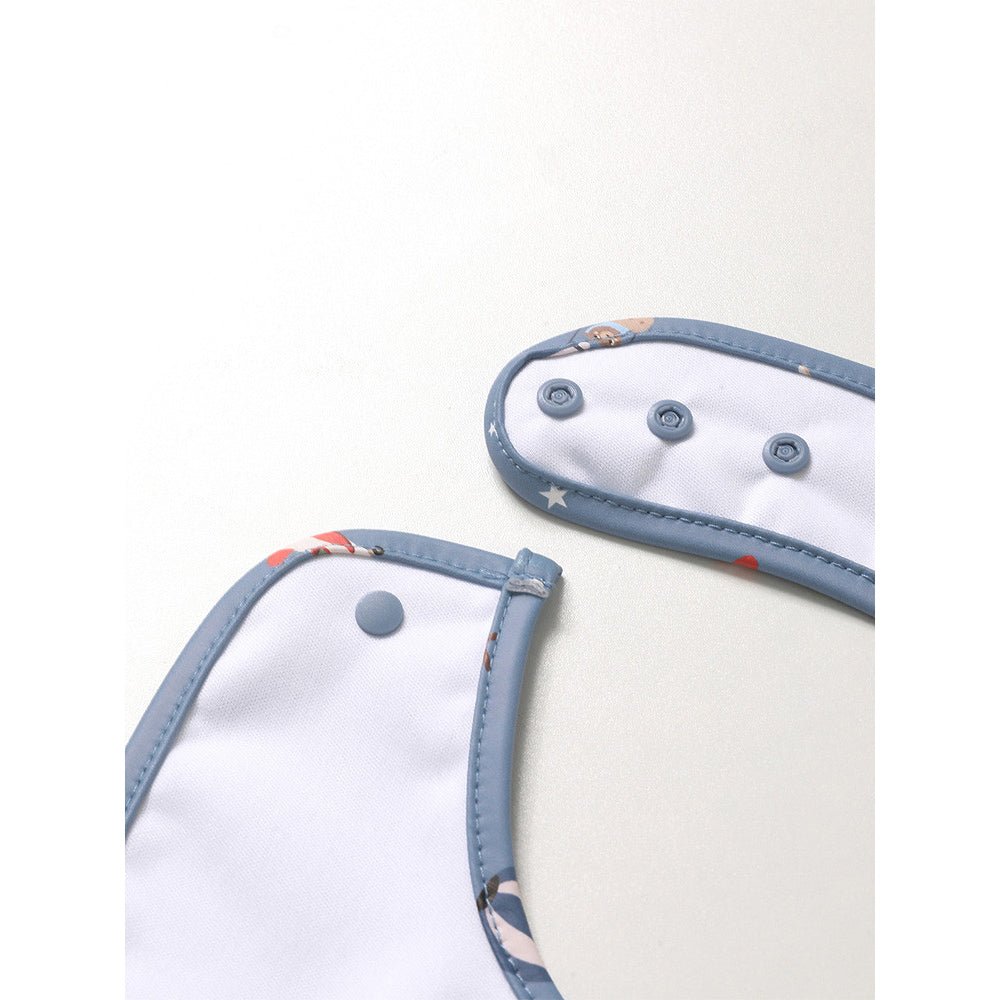 BABERO IMPERMEABLE TUTETE ·PLANES· - Happy Moments Baby