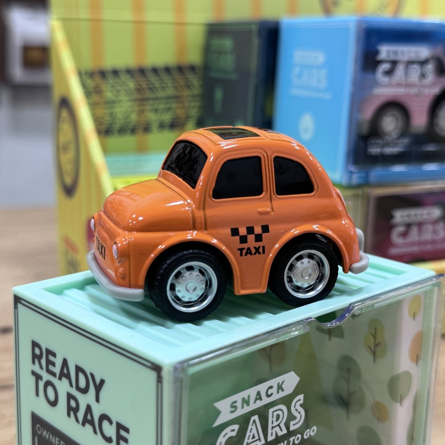 COCHE DE JUGUETE SNACK CARS ·TAXI NARANJA· - Happy Moments Baby