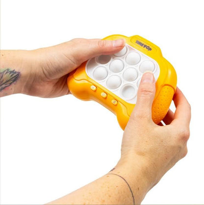 JUEGO SENSORIAL DE BOLSILLO ·TIMEPOP NARANJA· - Happy Moments Baby