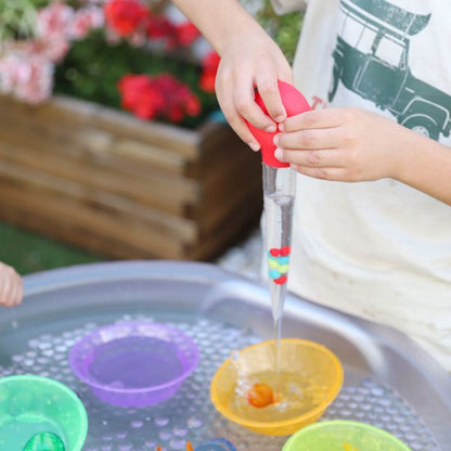JUGUETE DE BAÑO HAPE ·PIPETA MEGA CUENTAGOTAS ROJO· - Happy Moments Baby