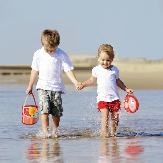 JUGUETE DE PLAYA HAPE ·PLEGAR Y LISTO· - Happy Moments Baby