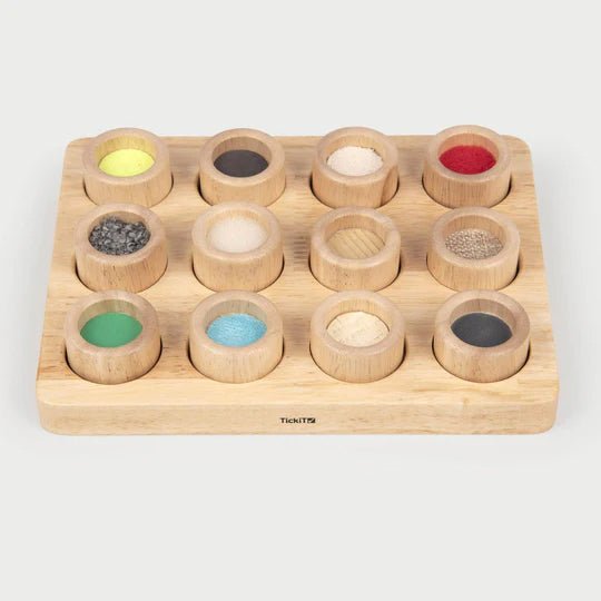 JUGUETE ESTIMULACIÓN SENSORIAL TICKIT ·TABLERO TOCA Y COMBINA· - Happy Moments Baby