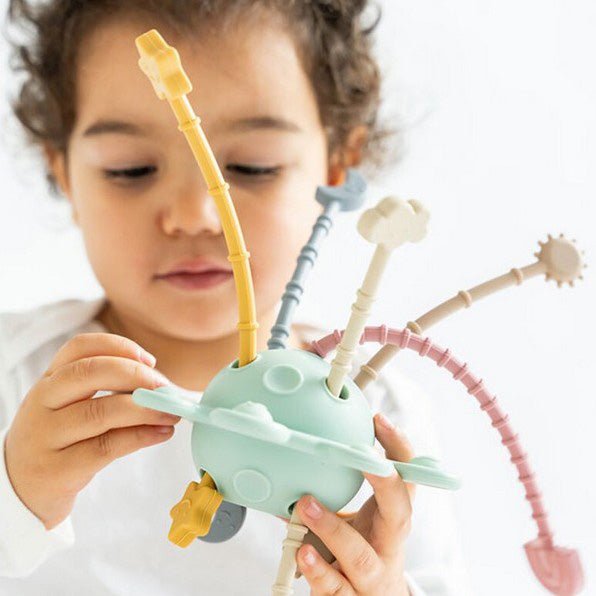 JUGUETE SENSORIAL DE SILICONA SARO ·TOY PLANET· - Happy Moments Baby