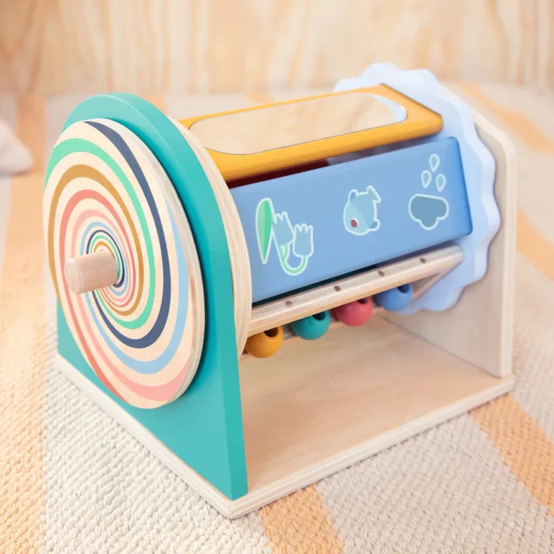 Detalle del espejo, cuentas y espiral de Tournicolor — Lilliputiens