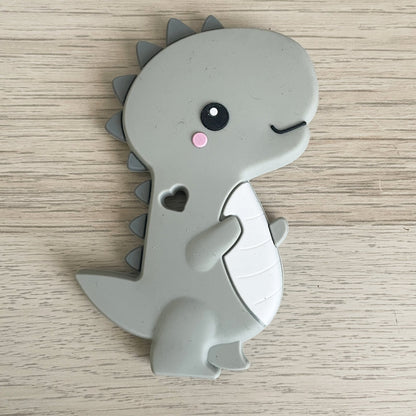 MORDEDOR FIGURA ·DINO BEBÉ GRIS· - Happy Moments Baby