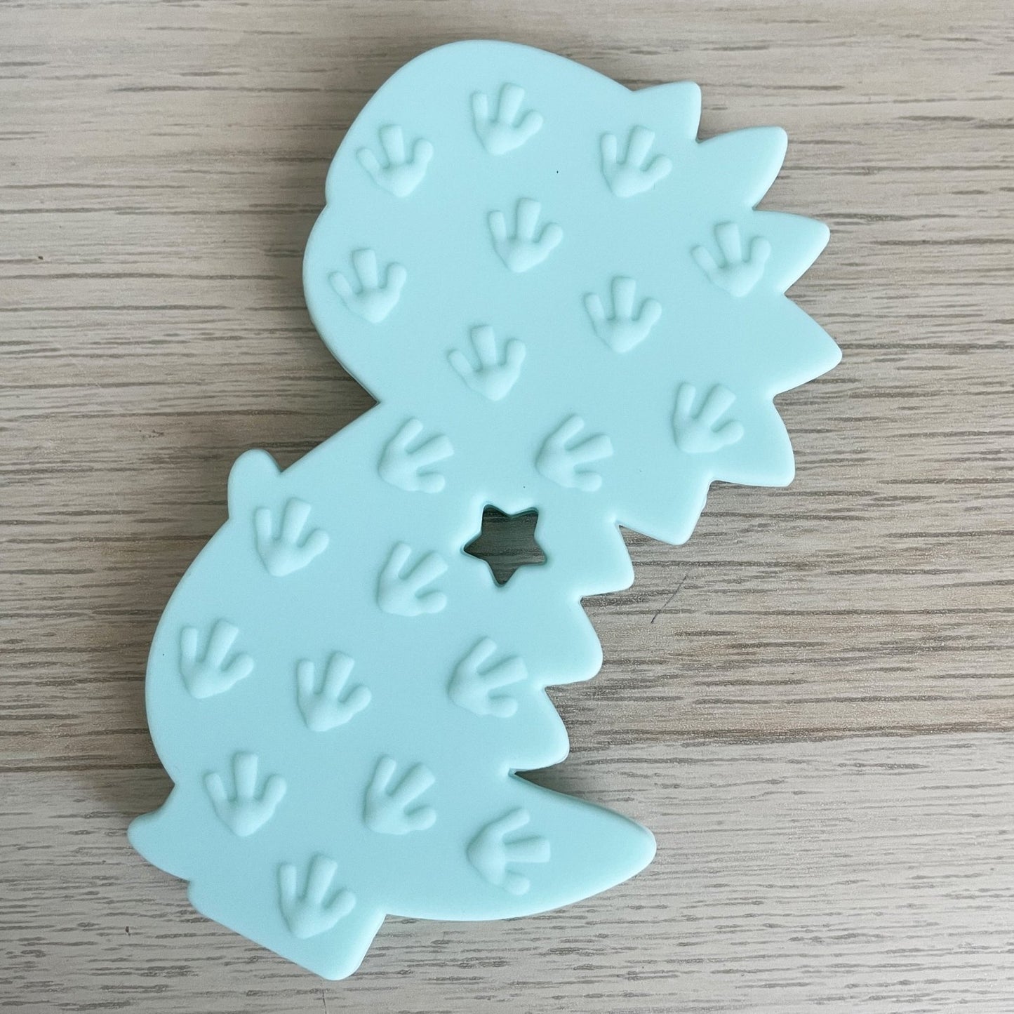 MORDEDOR FIGURA ·DINO BEBÉ TURQUESA· - Happy Moments Baby