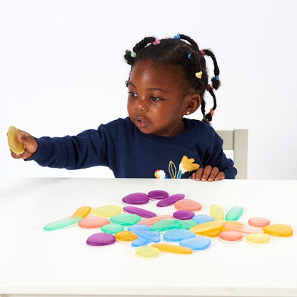 SET DE 36 UNIDADES DE PIEDRAS DE RÍO DE COLORES TRANSLÚCIDAS TOPILUDO - Happy Moments Baby